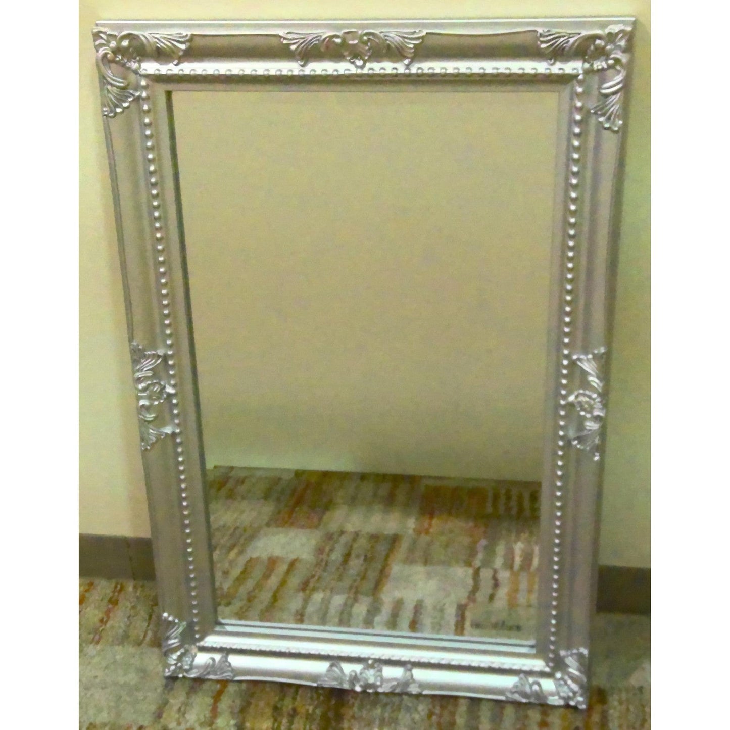 24" Ornate Silver Resin Wall Mirror