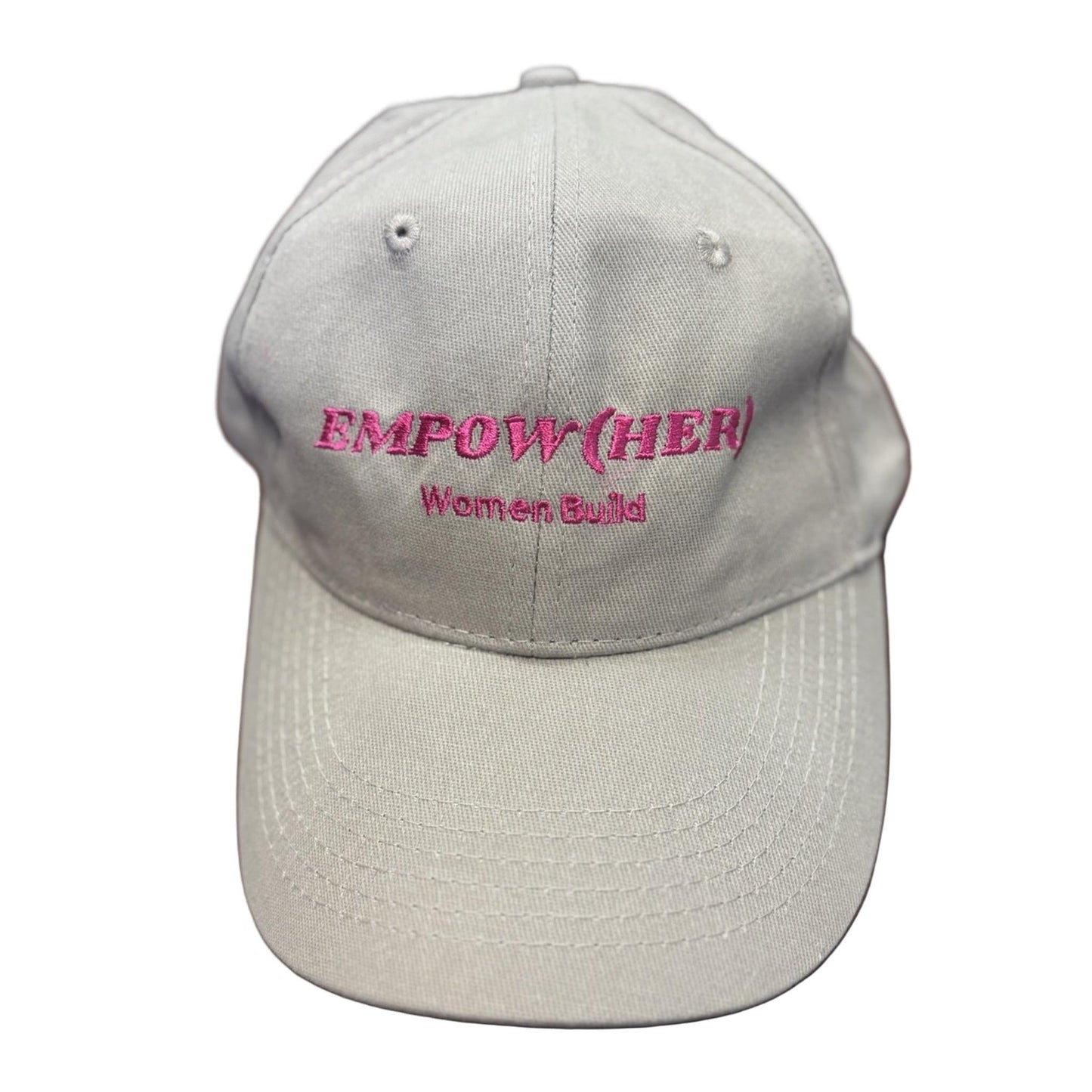 Khaki cap with hot pink 'EMPOW(HER) Women Build' text embroidered on it