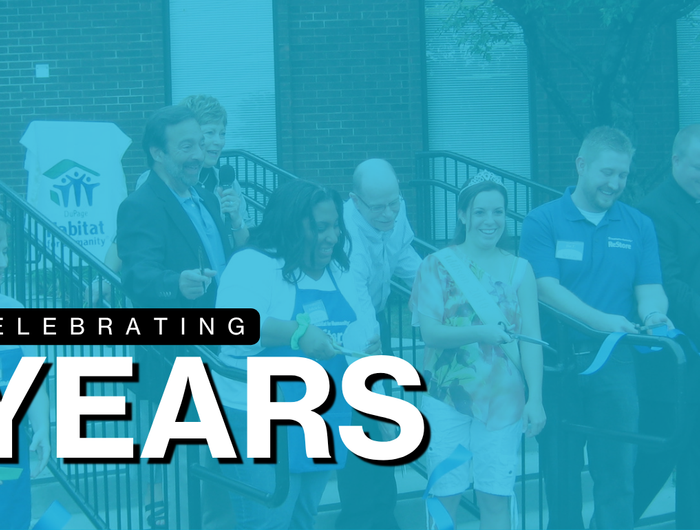 Photo of ReStore and Habitat employees at Addison's ribbon cutting in July 2011.