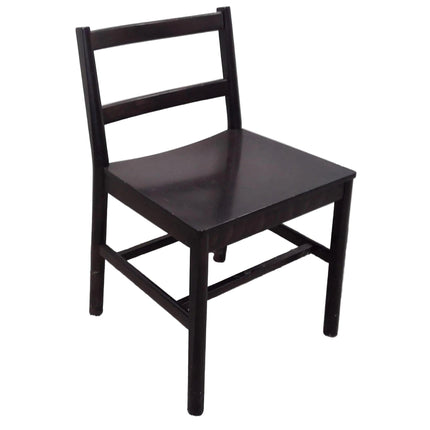 Dark wooden chair against a white background