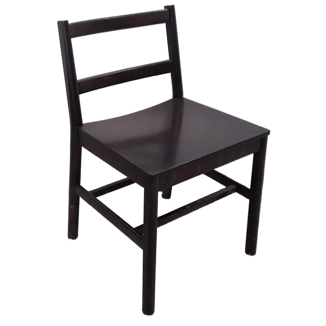 Dark wooden chair against a white background
