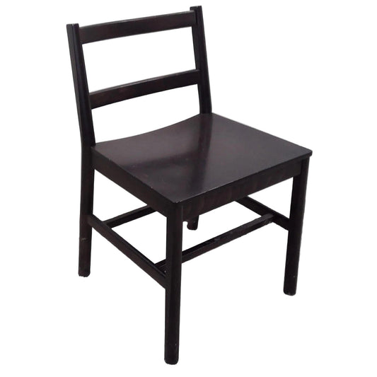 Dark wooden chair against a white background