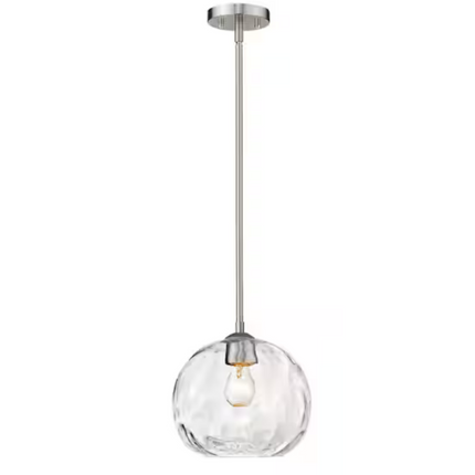 Clear glass pendant light with metallic fixture on a white background