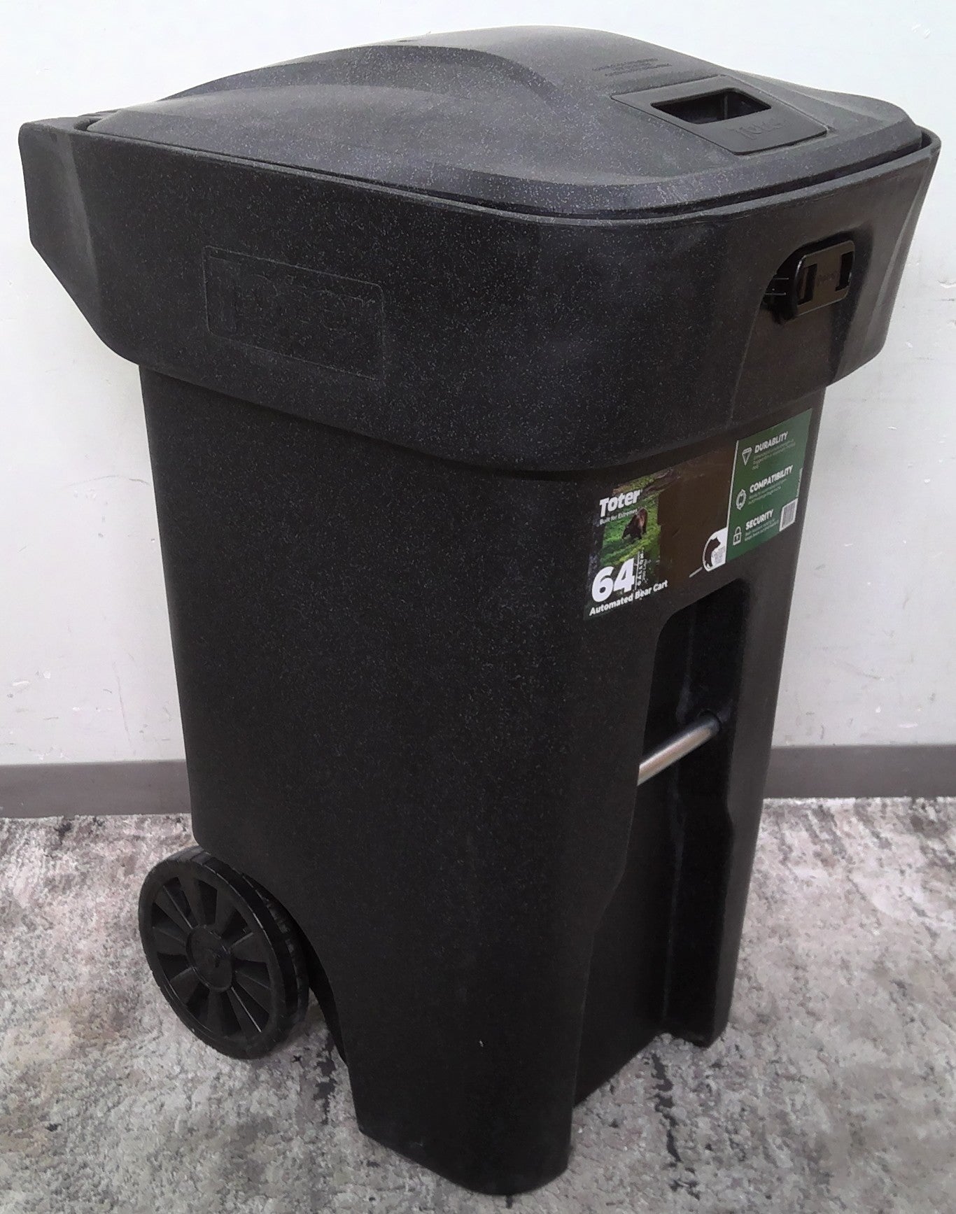 Bear Resistant 64 Gallon Black Polyethylene Wheeled Garbage Can With Lid